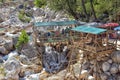 A lot of people bathing in a mountain stream canyon Kuzdere during jeep safari on the Taurus mountains. Royalty Free Stock Photo