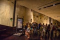 Lot of people, citizens and tourists, visit the interior of the 9/11 National Memorial Museum in New York City - United States of