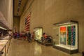 Lot of people, citizens and tourists, visit the interior of the 9/11 National Memorial Museum in New York City - United States of Royalty Free Stock Photo