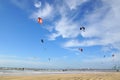 A lot of people kiteboarding on the beach. Royalty Free Stock Photo