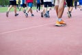 A lot of people walk excercise on runing track background, blank