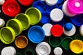 A lot of plastic bottle caps. Top view of bottle caps made of recycled plastic. Separate garbage collection. Recycling of plastic Royalty Free Stock Photo