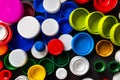 A lot of plastic bottle caps. Top view of recycled plastic bottle caps. Separate garbage collection. Recycling of plastic for Royalty Free Stock Photo