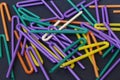 A lot of plastic tubules for drinks. Close-up of straw multi-colored tubes