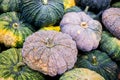 a lot of pumpkin at outdoor farmers market.Recently harvested pumpkins in a random pile. Royalty Free Stock Photo