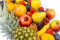 Lot of ripe fruit. Pineapple. coconut, orange, bananas and fruit on white background Royalty Free Stock Photo