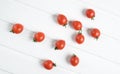 A lot of ripe mini cherry tomato on a white background. Royalty Free Stock Photo