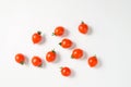 A lot of ripe mini cherry tomato on a white background. Royalty Free Stock Photo