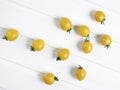 A lot of ripe mini cherry tomato on a white background. Royalty Free Stock Photo