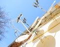 A lot of satellite dishes mounted on the wall. Royalty Free Stock Photo