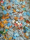 A lot of scattered puzzle pieces