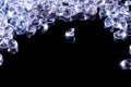 Shiny diamonds on a black background