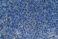 A lot of small blue glass stones on the wall surface Royalty Free Stock Photo