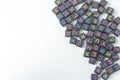 A lot of small cubes with letters on a white background. Royalty Free Stock Photo