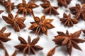 A lot of star anise on a white background close-up Royalty Free Stock Photo