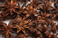 A lot of star anise on a white background close-up Royalty Free Stock Photo