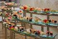 A lot of sushi rolls on the glass buffet. Japan traditional food on table with eastern decor. catering Royalty Free Stock Photo