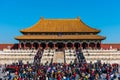 A lot of tourists entering the Taihe Palace, Hall of Supreme Harmony of the Forbidden City, the main buildings of the royal palace Royalty Free Stock Photo