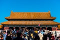 A lot of tourists entering the Taihe Palace, Hall of Supreme Harmony of the Forbidden City, the main buildings of the royal palace Royalty Free Stock Photo