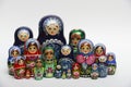 Lot of traditional Russian nesting dolls on white Royalty Free Stock Photo