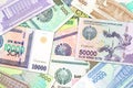 A lot of Uzbek Som banknotes indicating growing economy