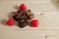 Lot of variety chocolate pralines on wood background