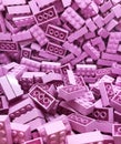 A lot of Violet plastic Lego blocks.