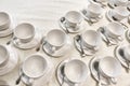 A lot of white coffee cups. Top view on many stacked in rows of empty clean white cups for tea or coffee Royalty Free Stock Photo