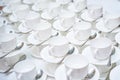 A lot of white coffee cups. Top view on many stacked in rows of empty clean white cups for tea or coffee Royalty Free Stock Photo