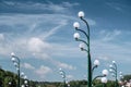 a lot of white round lights on sky background with white clouds Royalty Free Stock Photo