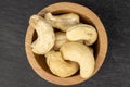 Fresh cashew nut on grey stone