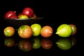 Fresh tomato de barao isolated on black glass Royalty Free Stock Photo