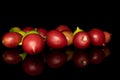 Fresh tomato de barao isolated on black glass Royalty Free Stock Photo