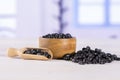 Raw black turtle beans with blue window