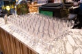 A lot of wine glasses in a row .Empty clean glasses standing in a row on a table prepared by the bartender for champagne and wine Royalty Free Stock Photo