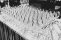 A lot of wine glasses in a row .Empty clean glasses standing in a row on a table prepared by the bartender for champagne and wine Royalty Free Stock Photo