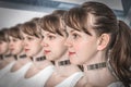 A lot of women in a row with barcode - genetic clone concept Royalty Free Stock Photo