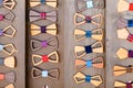 A lot of wooden bow ties. Royalty Free Stock Photo