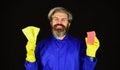 A lot of work. Housekeeping concept. Duty and cleaner. male using sponge. Take care hygiene. bearded man in yellow