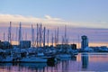 A lot of yachts moored in the busy harbor of Barcelona. Scenic morning landscape of harbor in Barcelona. Royalty Free Stock Photo
