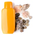 Lotion and some pebble and shells Royalty Free Stock Photo