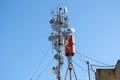 Advanced Wireless Network Infrastructure: Antennas, Telecommunication, and Satellite Dishes on Building Roof Royalty Free Stock Photo