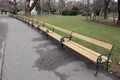 Lots of benches in a row in a Vienna park