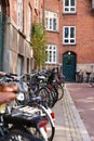 Lots of bicycles on the street of Copenhagen.