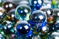 Lots of blue and green glass balls, beads on a white background, close-up Royalty Free Stock Photo