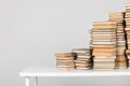 lots of books stacked on the table for studying at the university college library Royalty Free Stock Photo