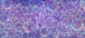 Lots and lots of bubbles in lilac background banner