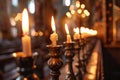 Lots of candles burning in church. Praying in candle light. Festive church decoration Royalty Free Stock Photo