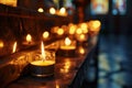 Lots of candles burning in church. Praying in candle light. Festive church decoration Royalty Free Stock Photo