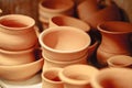 Lots of ceramic pots and jugs on the table. Royalty Free Stock Photo